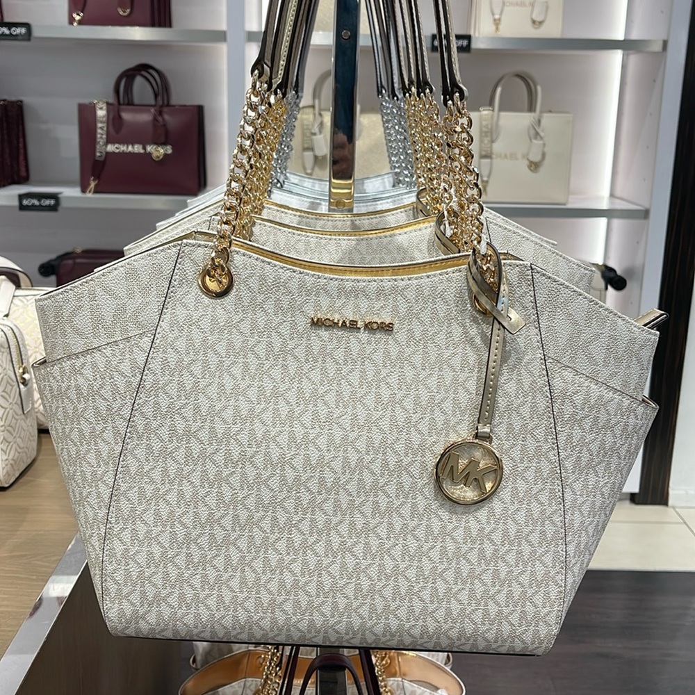 MICHAEL KORS 
Jet Set Travel Large Signature Chain Shoulder Tote Bag
Pale Gold
